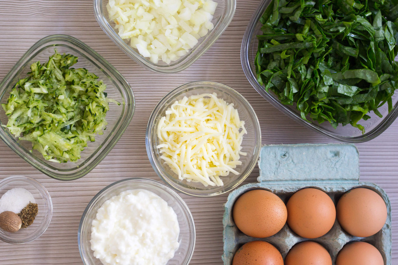 quiche ingredients in individual containers